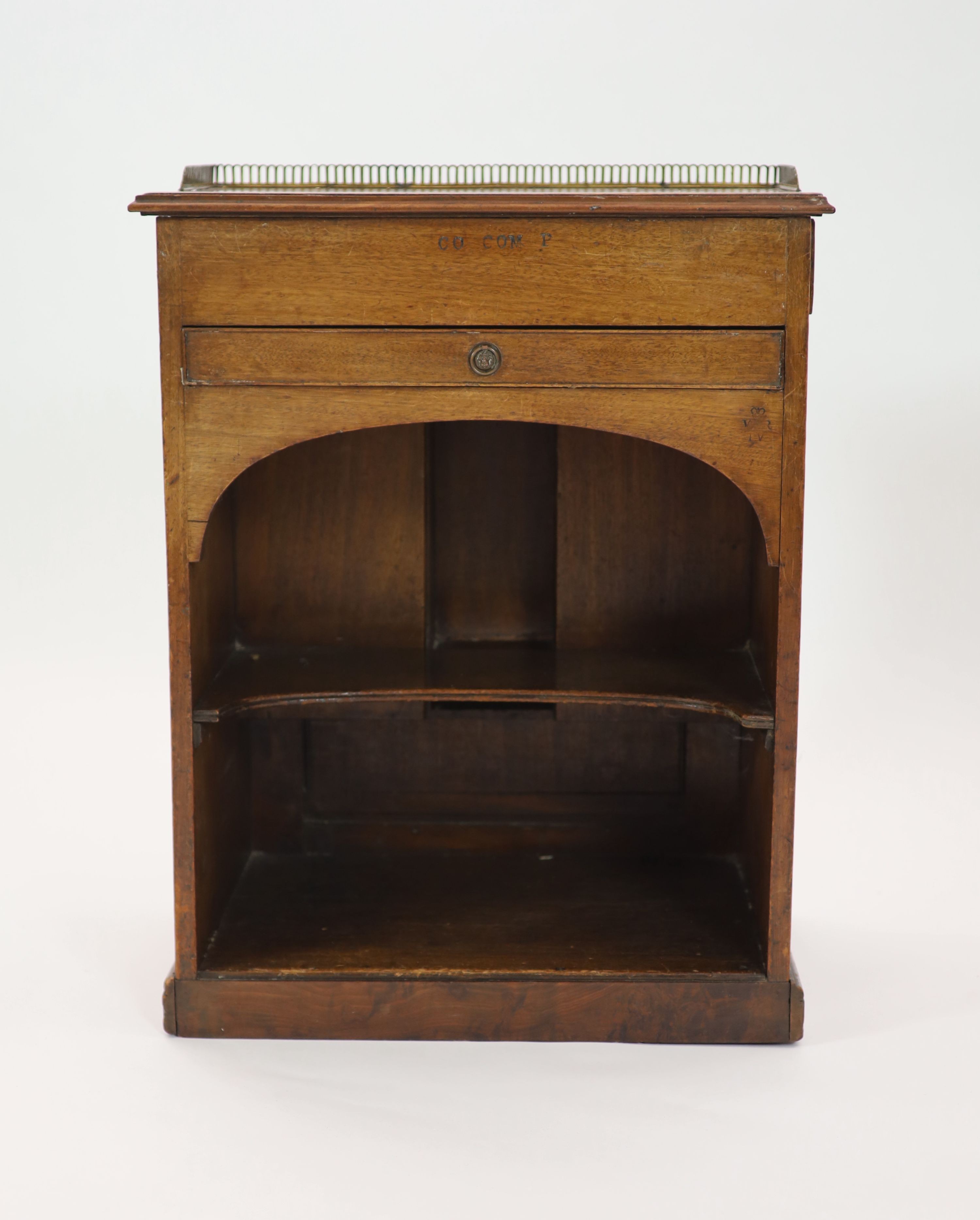 Royal furniture. A William IV mahogany bedside cupboard combined writing chest, H 77cm. W 58cm. D 42cm.